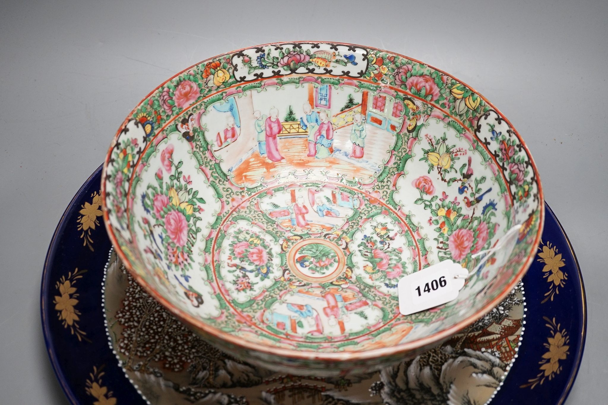 A late 19th century famille rose bowl and a Chinese porcelain dish, bowl 30 cms diameter.